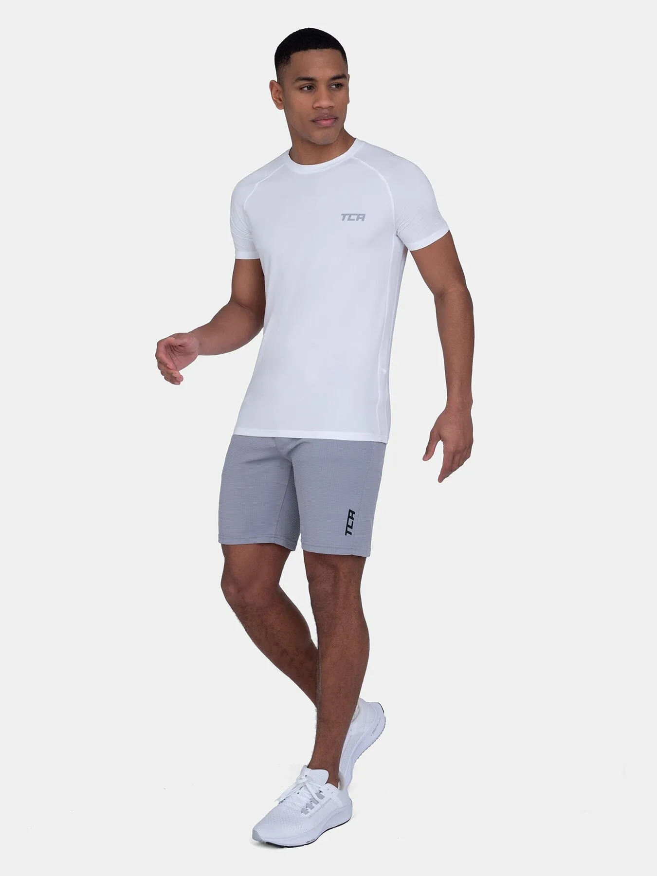 Stamina Short Sleeve Crew Neck Running Top For Men With Back Zip Pocket